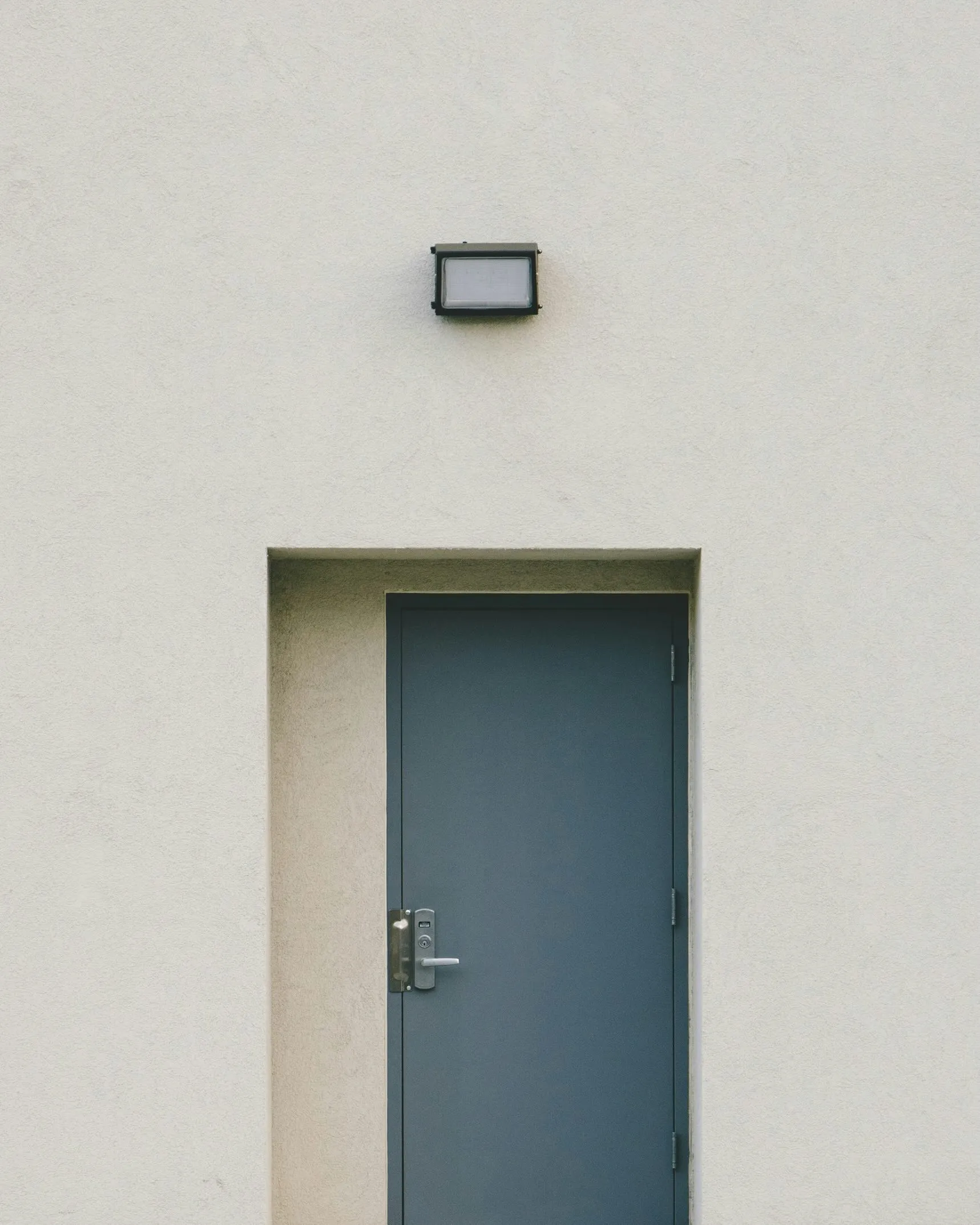 Fascade of building with door and light