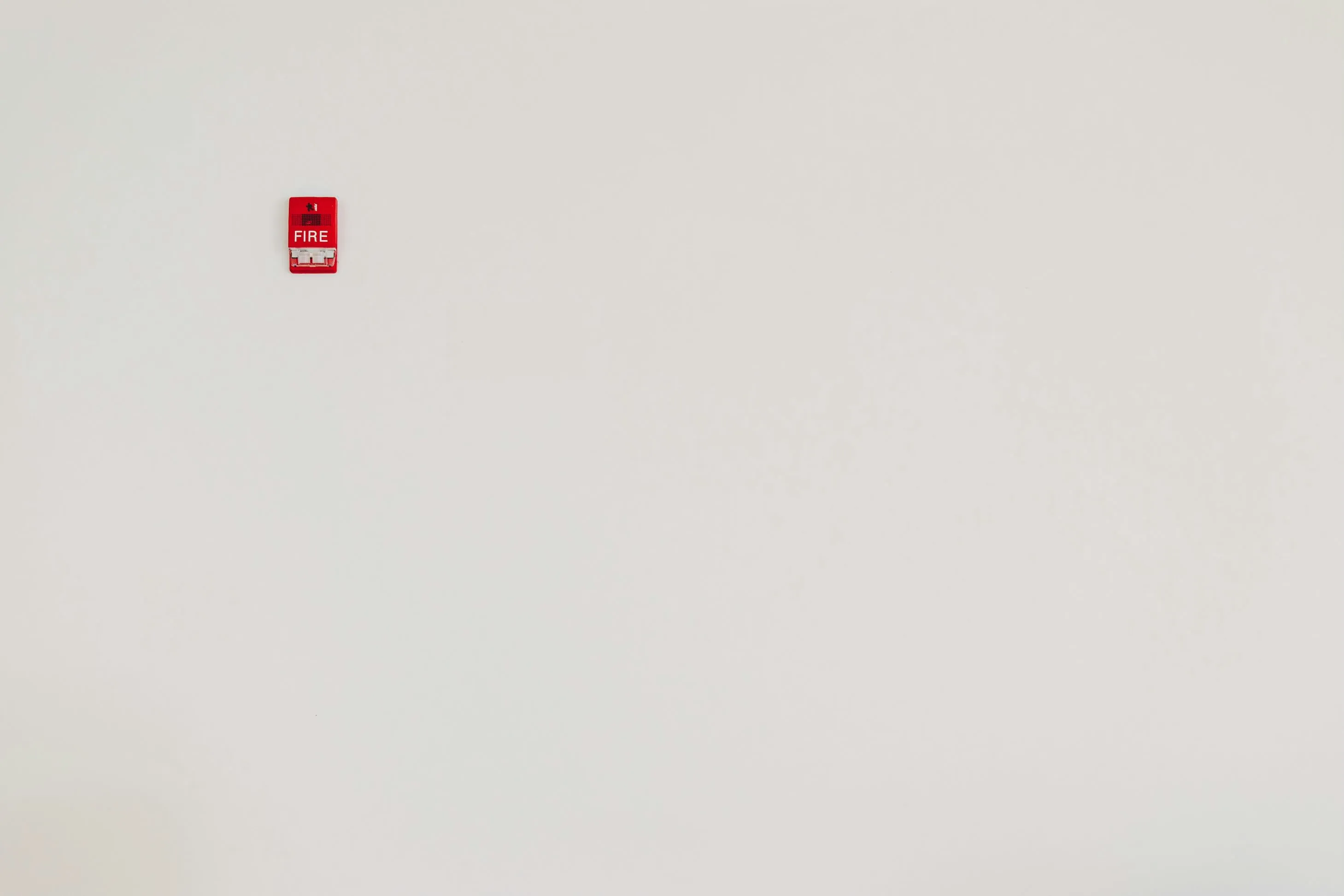 Fascade of fire alarm on wall